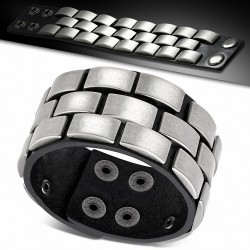 Bracelet en cuir noir avec rangée de boutons-pression rectangulaires